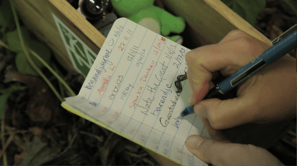 Geocaching success can include signing a finders-book